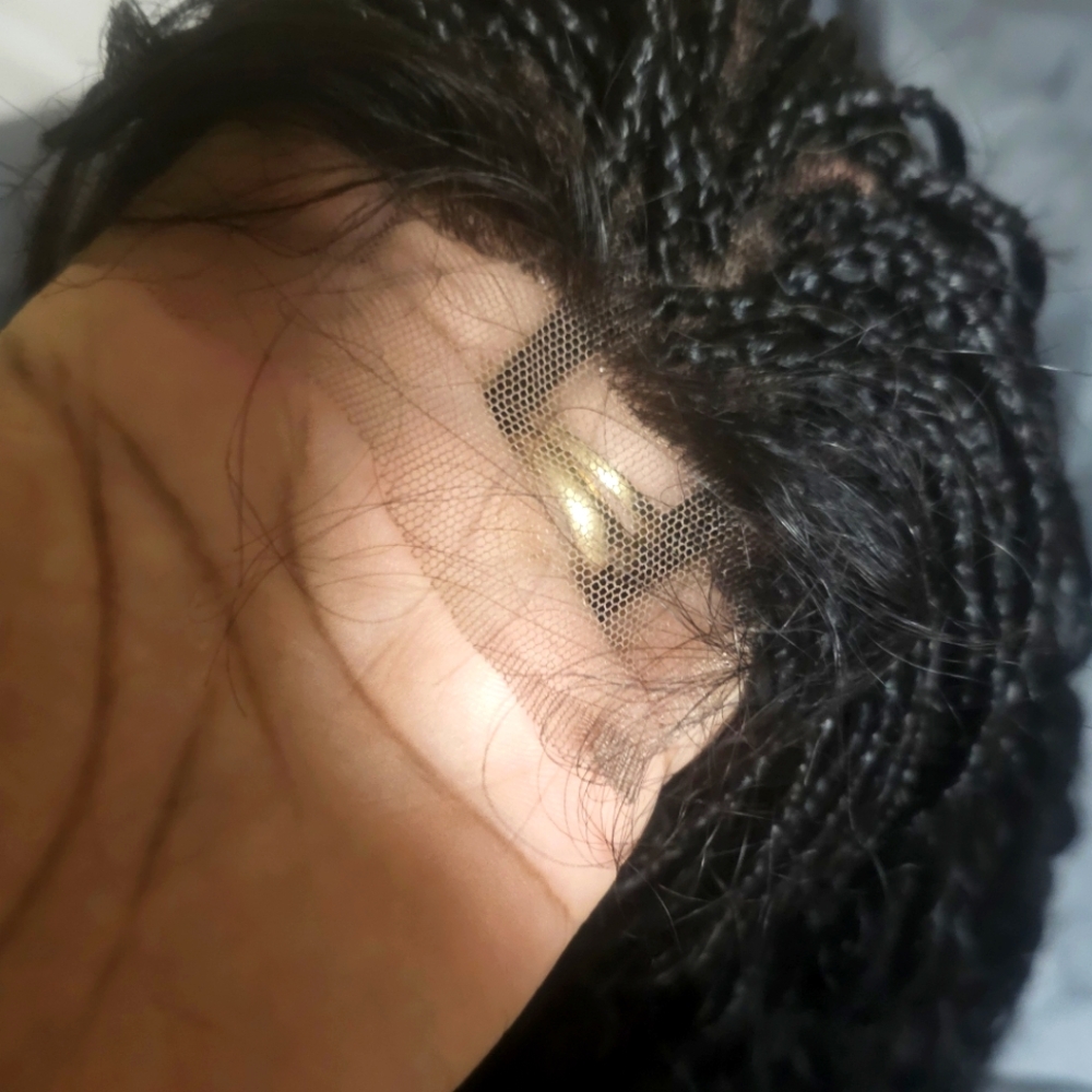 Braided curly wig brand new. Sm cap size